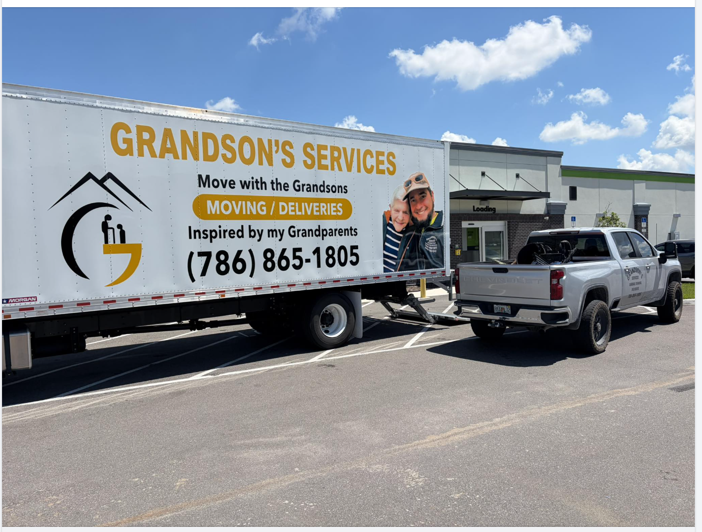 Grandson's Services truck on a residential street
