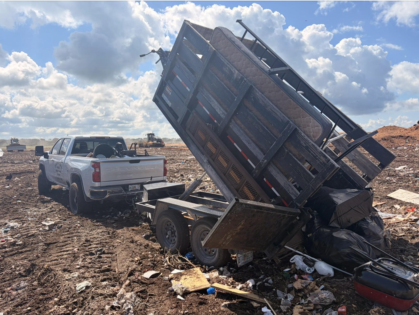 Dump trailer unloading at the landfill